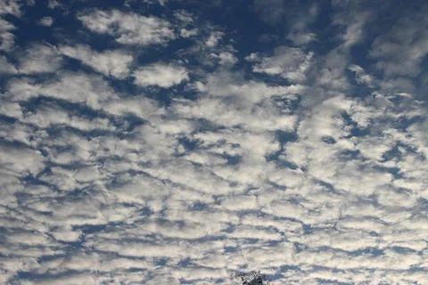 Cloudy bright beauty in the sun bright and calm winter air background. Ligh.. Stock Photos
