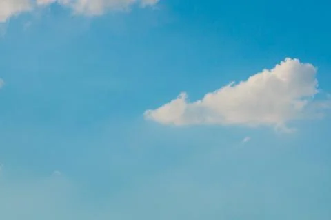 Cloudy bright blue sky background Stock Photos