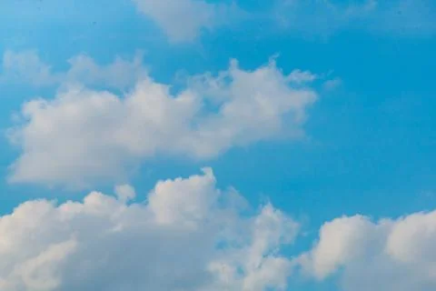 Cloudy bright blue sky background Stock Photos