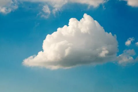 Cloudy bright blue sky background Stock Photos