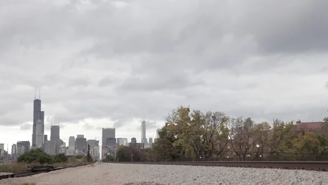 Cloudy Chicago Skyline Train Rolls By Stock Footage 79022125