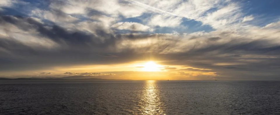 Cloudy Cloudscape during sunny summer Day on the West Coast of Pacific Ocean. Stock Photos
