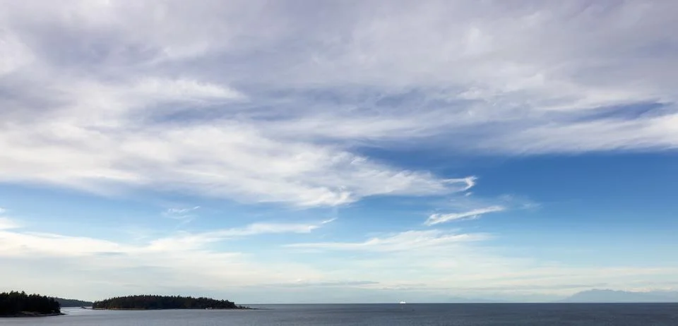 Cloudy Cloudscape during sunny summer Day on the West Coast Stock Photos