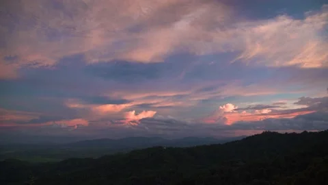 Cloudy Color in Evening Sky After Sunset with Mountain Landscape Stock Footage 141184719