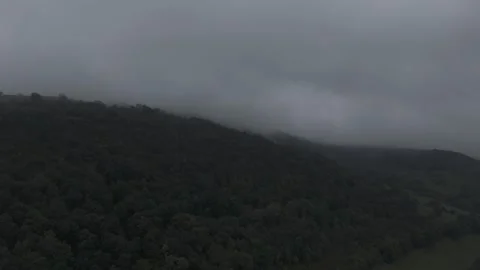 Cloudy dark forest hill in North Wales Stock Footage 288748929