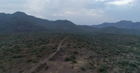 Cloudy dawn above the Rincon Mine Rode in the Weaver Mountain Range Stock Footage 138451757
