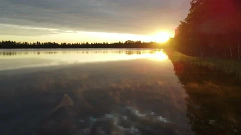 Cloudy dawn over the lake Stock Footage 200005756