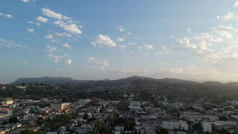 Cloudy Day Aerial View over Hollywood with Griffith Observatory and Sign Stock Footage 263778884