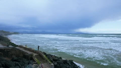 Cloudy day on the Atlantic ocean beach in Biarritz France Stock Footage 294860665