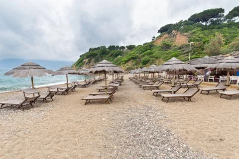 Cloudy day on the beach Stock Photos