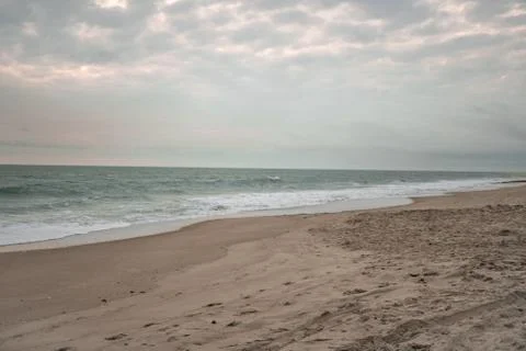 Cloudy day at the beach Stock Photos