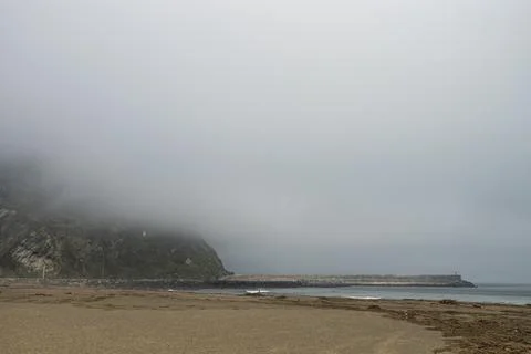 Cloudy day at beach Stock Photos