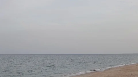 Cloudy day on the beach without people. Mediterranean Sea Stockbeeldmateriaal 109928218