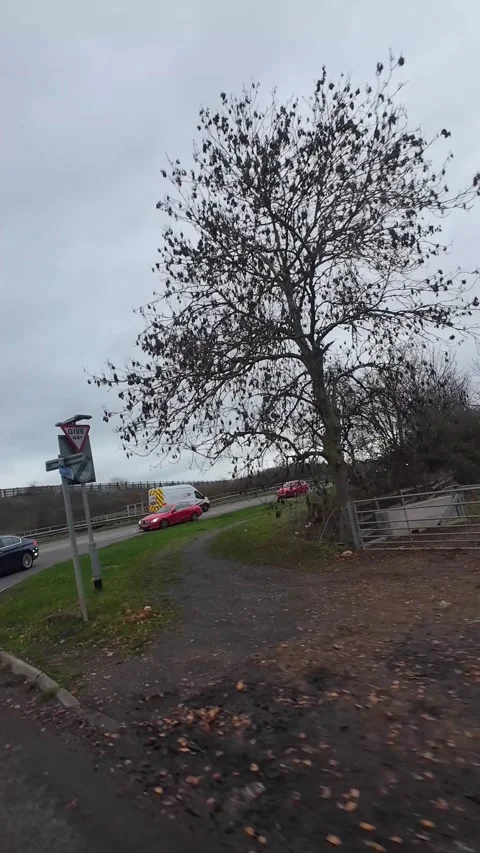 Cloudy Day Car Drive Through British Rural Country Road Video stock 324596640