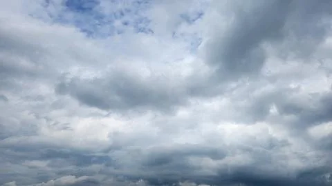 Cloudy day with dark, gray clouds and a chance of rain. Stock Photos