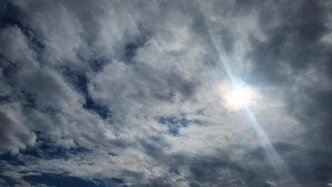 Cloudy day with dark, gray clouds and a chance of rain. Stock Photos