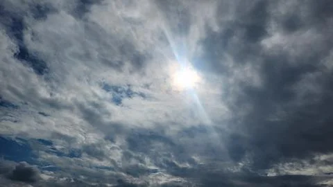 Cloudy day with dark, gray clouds and a chance of rain. Stock Photos