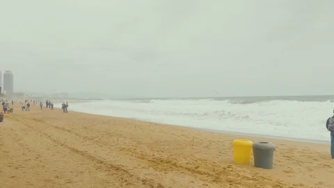 Cloudy day endless landscape. Beach Spain, Barcelona 03.05.2019. Sand, sea, wind Stock Footage 113129044