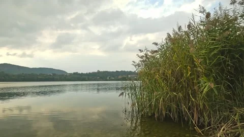 A cloudy day on Lake Corgeno Stock Footage 293553561