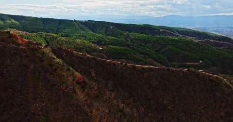 Cloudy Day Lonely Mountain Path On Forest Background Sun Rays Aerial Fly Over Stock-Footage 289409566