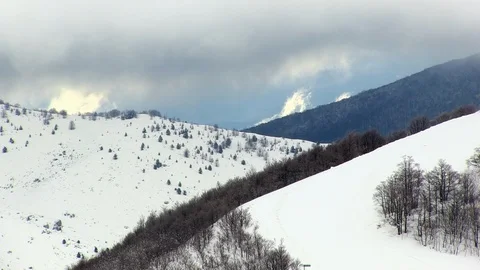 Cloudy day on mountains blu sky snow Stock-Footage 85748600
