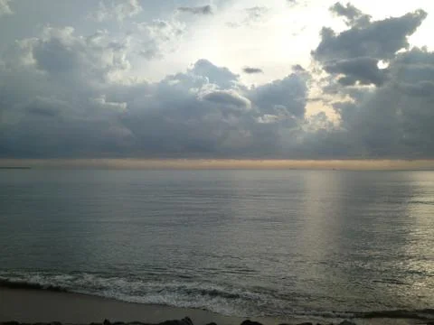 Cloudy day by the ocean Stock Photos
