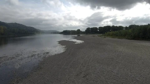 On a cloudy day over the river Video stock 103932855