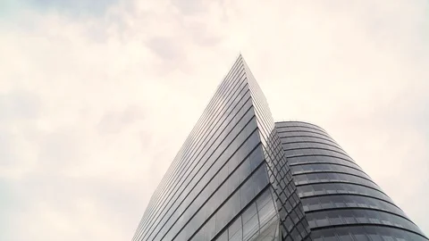 Cloudy day reflection at a business building, Vienna, Austria. Video stock 114694828