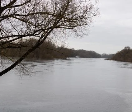 Cloudy day on the river in the rain Stock Photos