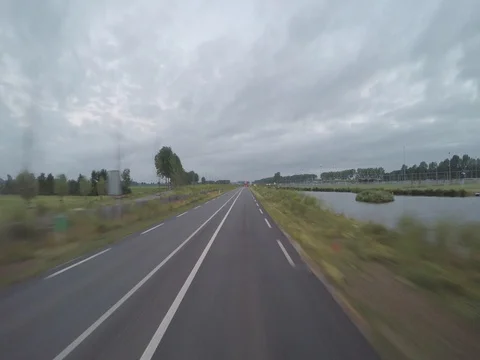 Cloudy day on the road Stock Footage 83476879