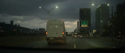 Cloudy day on the road recording from car handheld camera anamorphic video Stock Footage 267635992