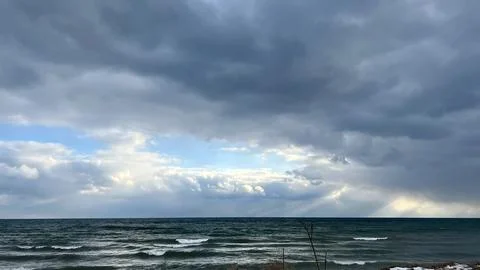 Cloudy day by the sea. Stock Photos