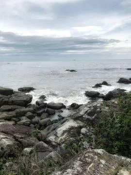 Cloudy day by the sea Stock Photos