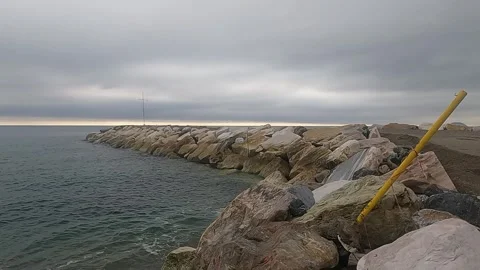 A cloudy day at the seaside Stock Footage 306555253