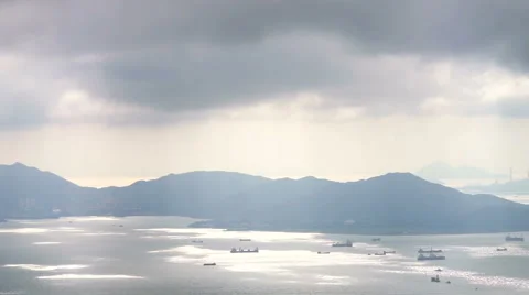 Cloudy day with sun shinning through Stock Footage 51526474