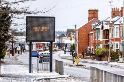 Cloudy Day Winter View of modern information sign with words Do Not Drink and Photos