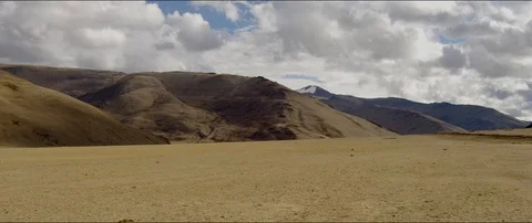Cloudy desert mountains Stock Footage 106811525