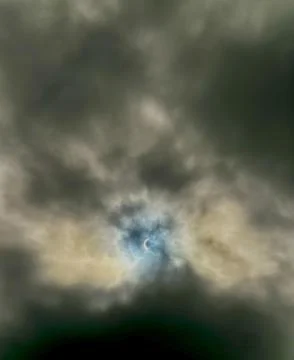 Cloudy Eclipse above Horseshoe Bay, Texas, 2024. Stock Photos