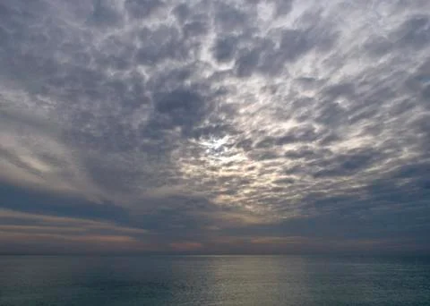 Cloudy evening at the sea Stock Photos