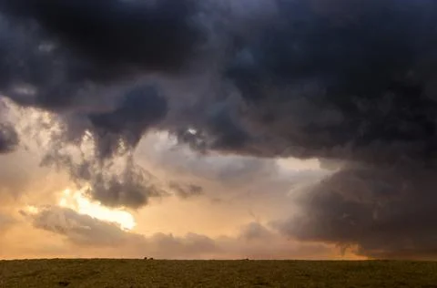 Cloudy evening sky under the sand of sea beach, Arabat Spit, Ukraine Stock Photos