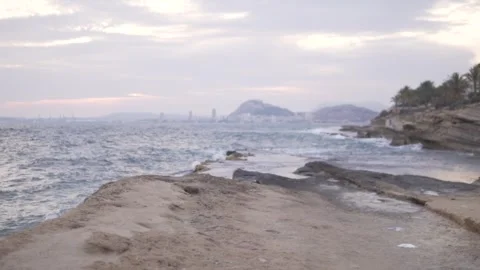 Cloudy evening in winter on the beach of Alicante, Cabo de Huertes area Stock Footage 265576179