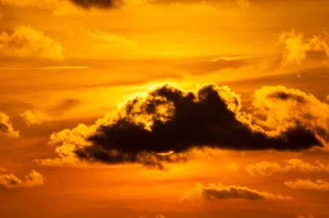 Cloudy in front of the sun Stock Photos