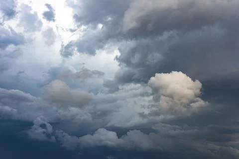 Cloudy gloomy evening sky, dramatic storm low clouds Stock Photos