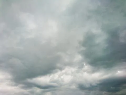 Cloudy grey dramatic stormy dark sky cloudscape Stock Photos