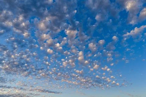 Cloudy horizon. Natural Clouds. Cloud panorama above blue atmosphere. Bright Stock Photos