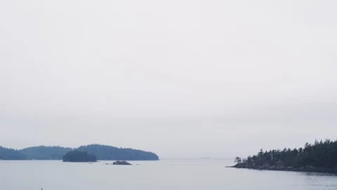Cloudy Island View - Puget Sound Region - San Juan Islands in the distance Stock Footage 87565966