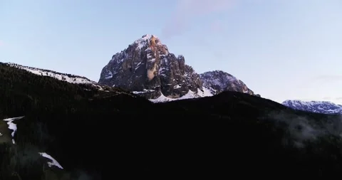 Cloudy Landscape with Dolomites Mountain in the background. Aerial of Sassolungo Stock Footage 132116794