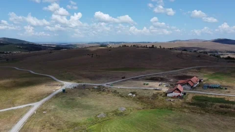 Cloudy landscape of a farm in the mountains Stock Footage 289222650