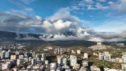 Cloudy landscape over a small Turkish town the drone moves smoothly to the left Vidéo 242546747