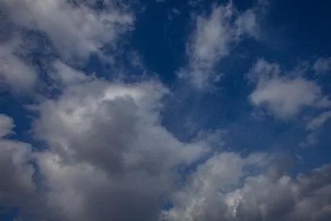 Cloudy landscape in the spring sky Stock Photos